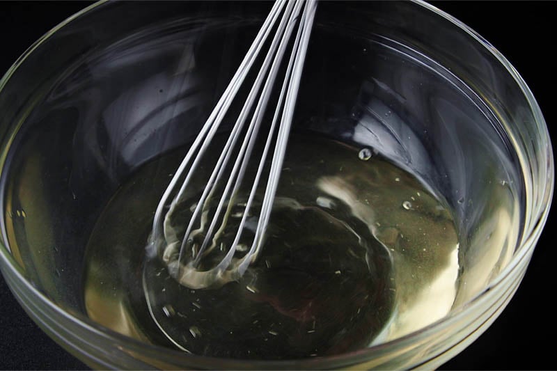 whisking the sugar and water together