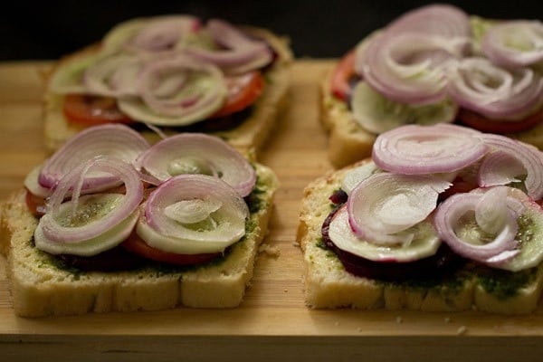 onion slices placed on veg sandwich. 
