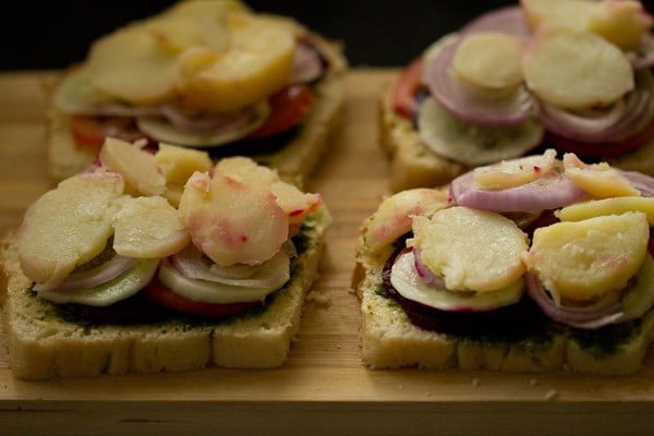 boiled potato slices placed on top of onion slices. 