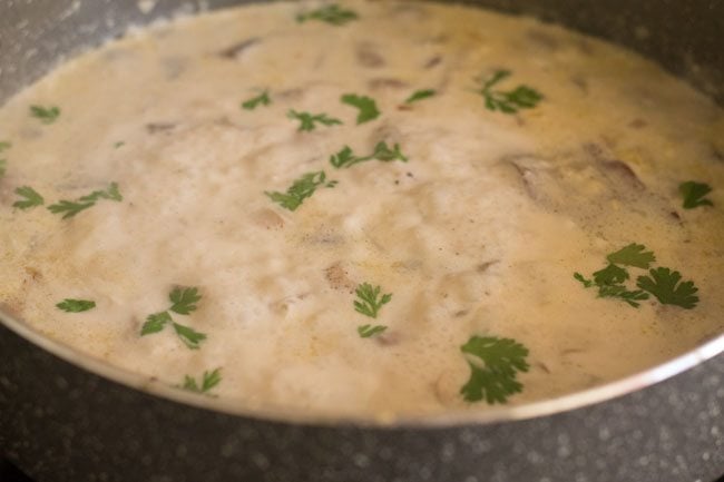 cream of mushroom soup with chopped parsley