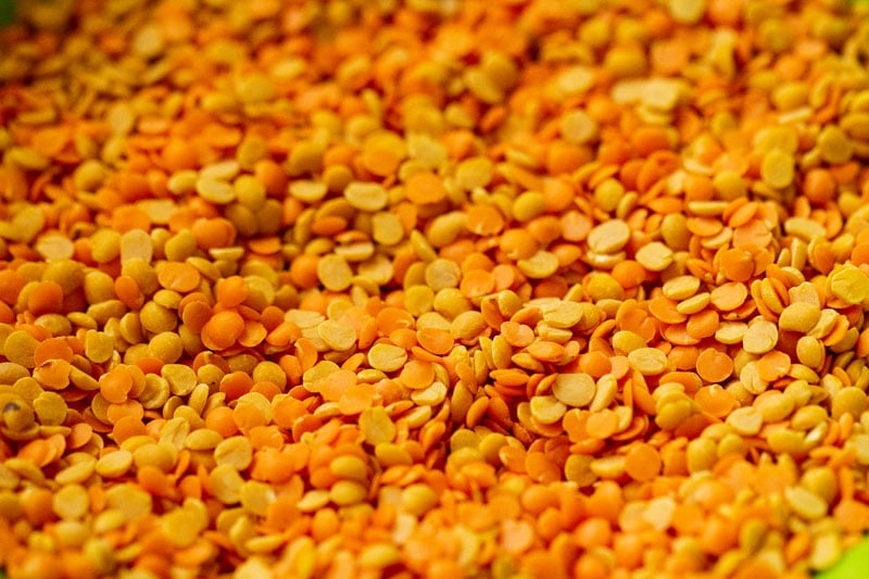 Uncooked yellow and orange lentils for dal fry recipe
