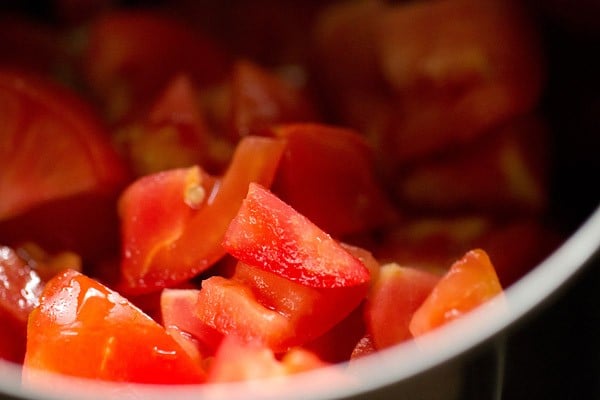 chopped tomatoes added in a blender