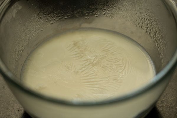 warm milk in a glass bowl