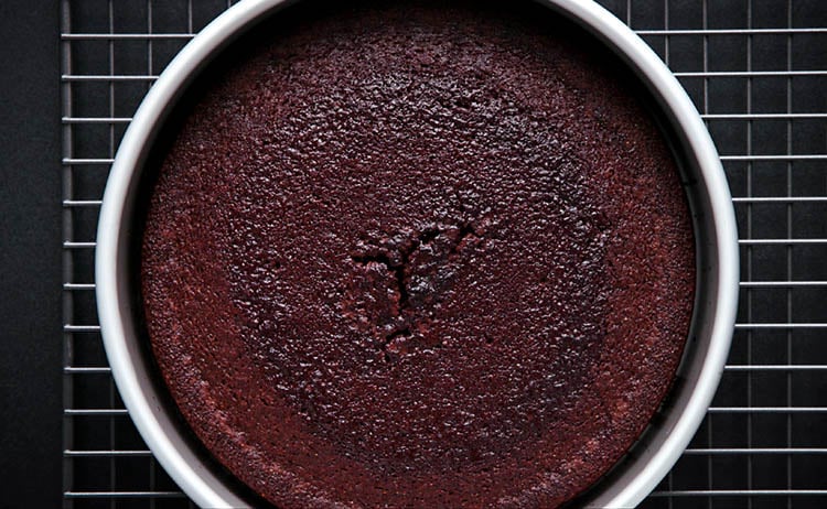 eggless chocolate cake in a tin after being baked