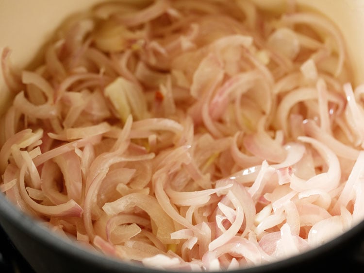 onions being sautéed