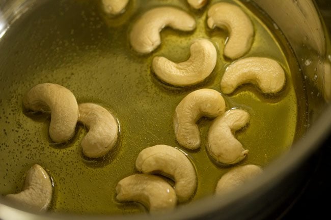 cashews in the ghee inside the pan