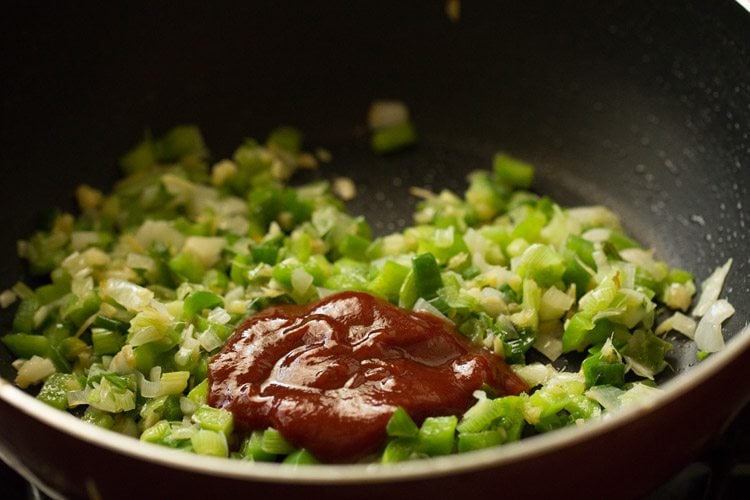 tomato ketchup on top of spring onions