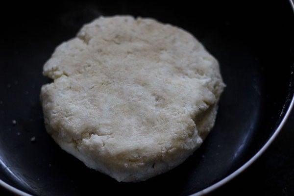 gulab jamun dough formed into a patty 