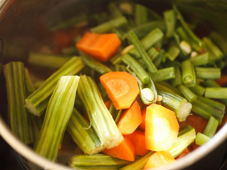 veggies added to mixture that take more time to cook