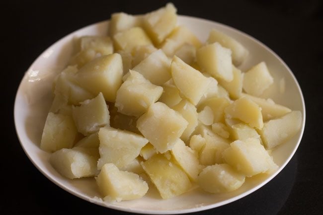 peeled and chopped potato cubes for making jeera aloo