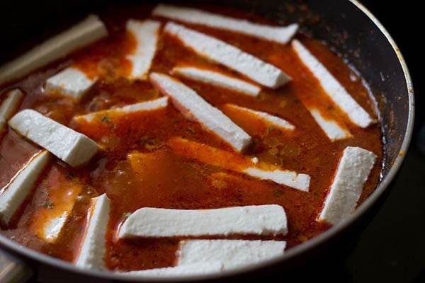 paneer cut in long rectangles are added to curry base for making kadai paneer recipe