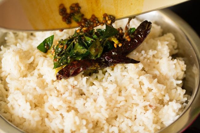 tempering mixture added to cooked rice in the bowl to make chitranna
