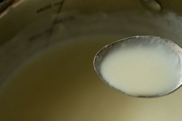 spoonful of the completed bechamel (white sauce).