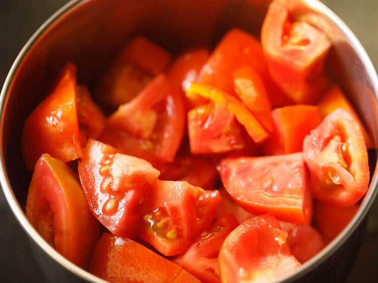 chopped tomatoes in a blender jar