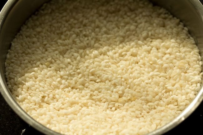 soaked and rinsed and drained rice in a bowl
