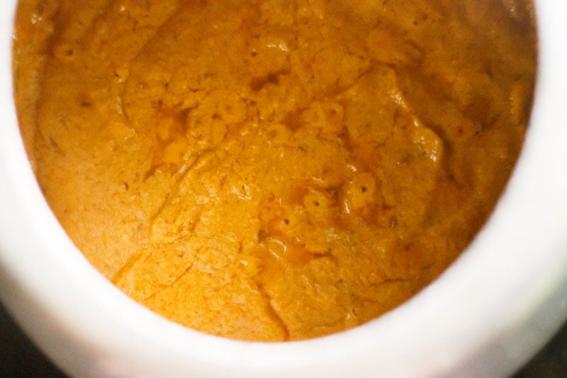 Top shot of masala paste in pressure cooker