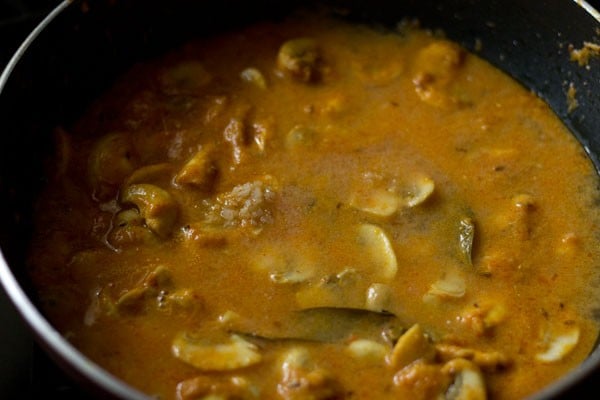salt added to mushroom masala curry to pan
