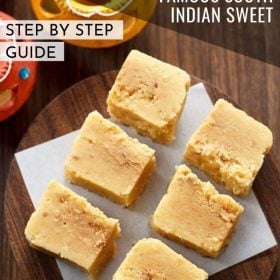 mysore pak cubes on top of parchment on a wooden tray with text layovers.