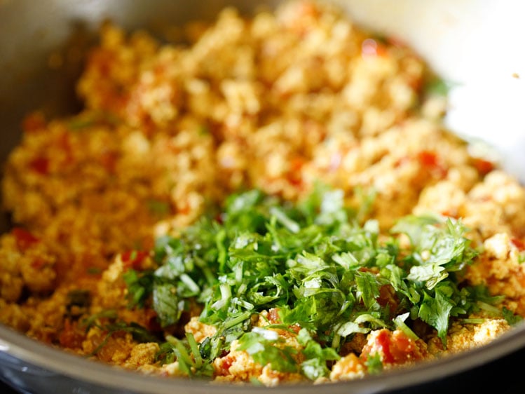 chopped coriander leaves added to cooked bhurji. 