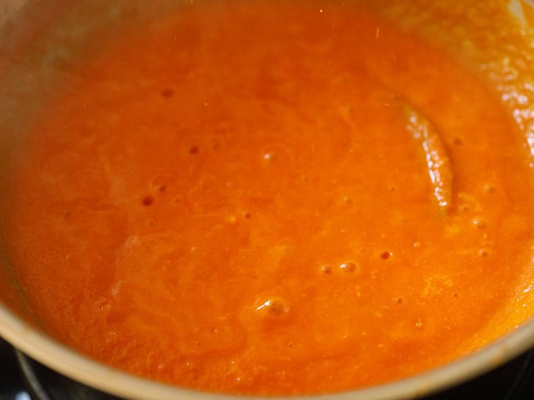 simmering tomato purée