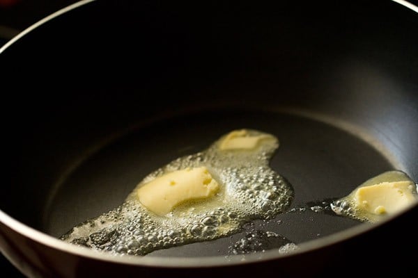 butter being melted in a pan