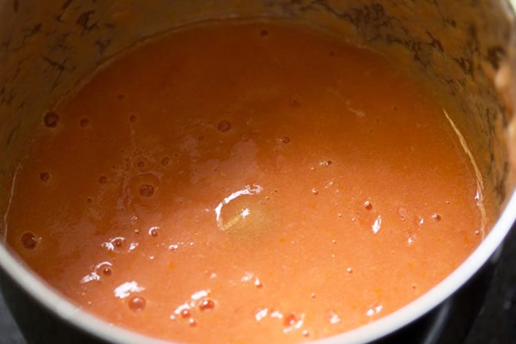 tomato pureed in a blender to make paneer tikka masala recipe.