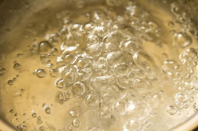 boiling water with salt and oil in a pan. 