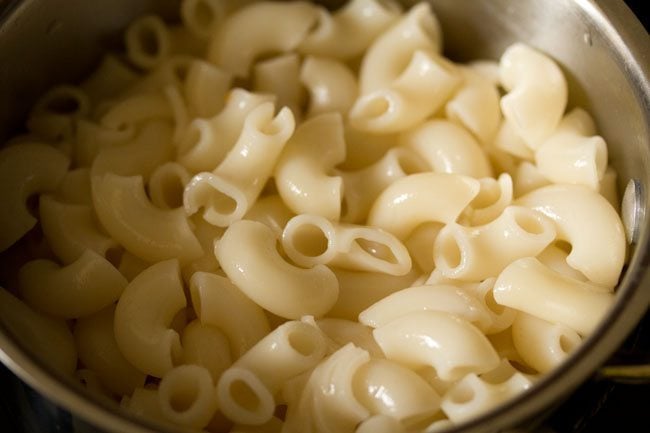 strained cooked pasta. 