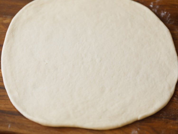 pizza crust rolled to a round circle