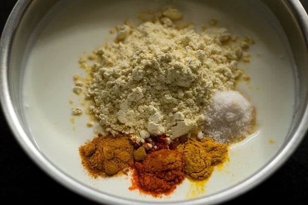 added gran flour, spice powders and salt to make kadhi