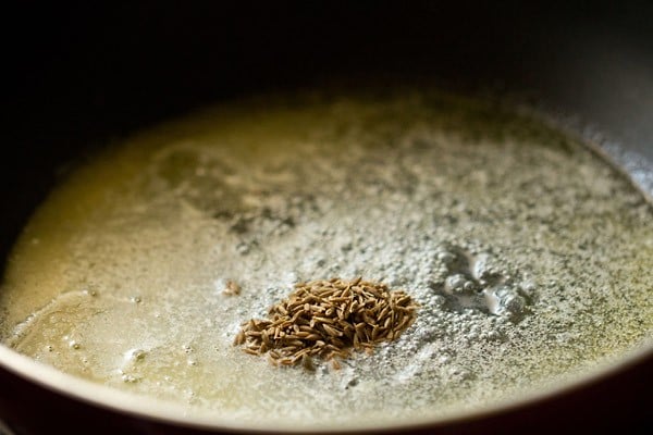 added cumin seeds in the frying pan
