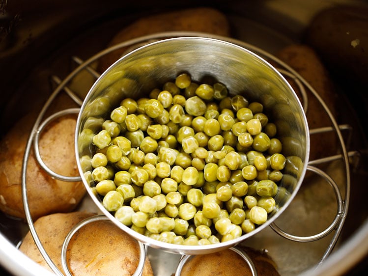 cooked potatoes and peas