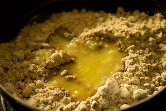 ghee added to the roasted sattu flour mixture. 