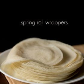 spring roll wrappers placed on a white plate with text layover.