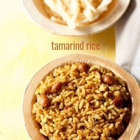 tamarind rice served in a bowl with fried papad and text layovers.