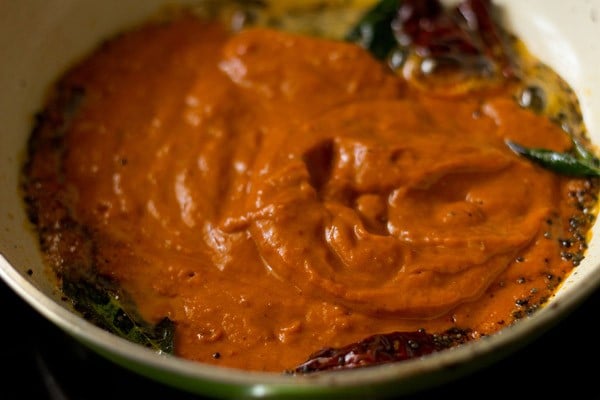 prepared tomato paste added to the tempering. 