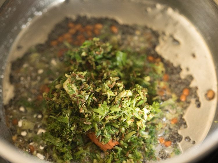 herbs and spices coarse mixture added in the pan