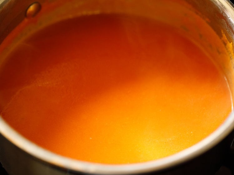 tomato soup being simmered on low heat