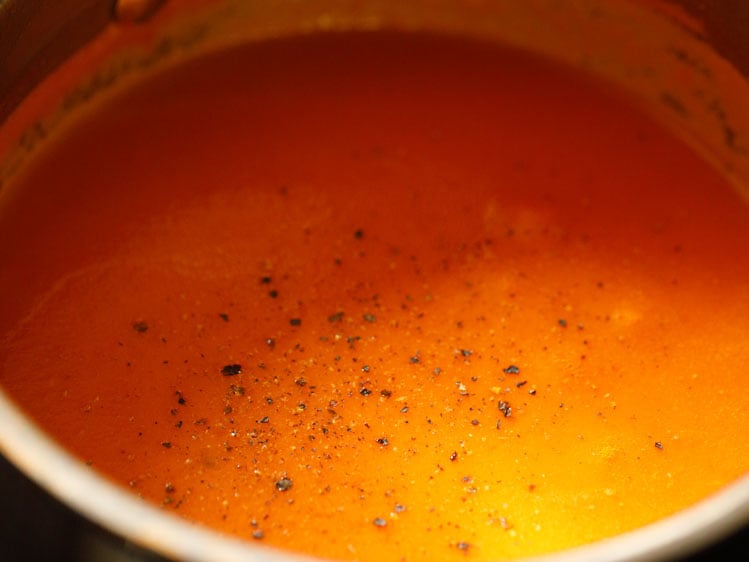 freshly crushed pepper added in the homemade tomato soup
