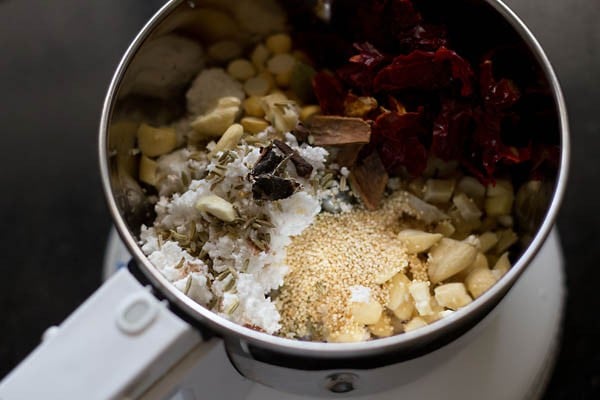 spices, nuts and seeds for vegan korma in a blender
